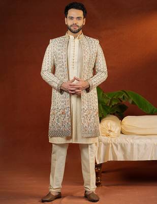 Cream heavy embroidered front open sleeveless jacket kurta set 1