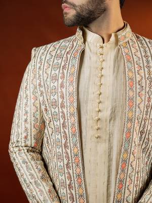 Cream heavy embroidered front open sleeveless jacket kurta set 2