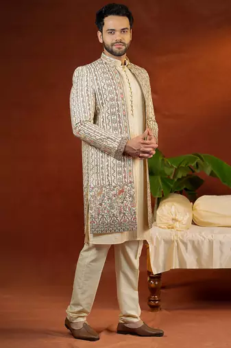 Cream heavy embroidered front open sleeveless jacket kurta set