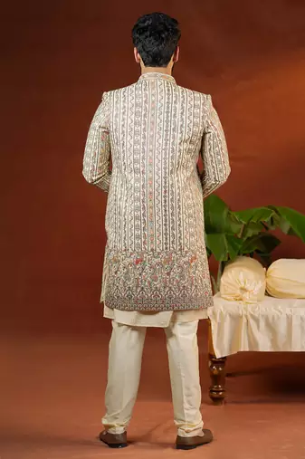Cream heavy embroidered front open sleeveless jacket kurta set