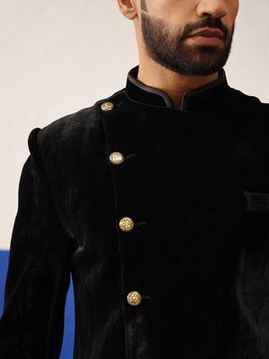Rishabh chawla in black velvet asymmetric indowestern 4