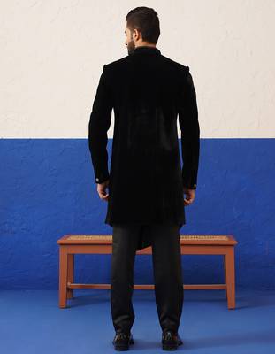 Rishabh chawla in black velvet asymmetric indowestern 5