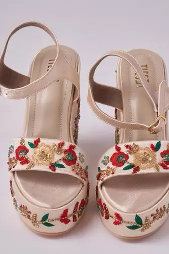 Gold woven leather wedges 