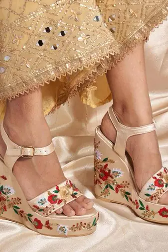 Gold woven leather wedges 