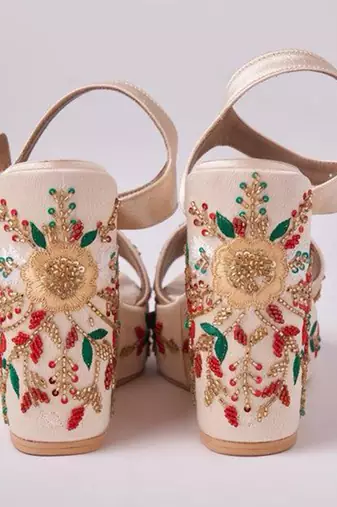 Gold woven leather wedges 