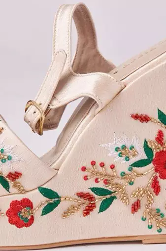 Gold woven leather wedges 