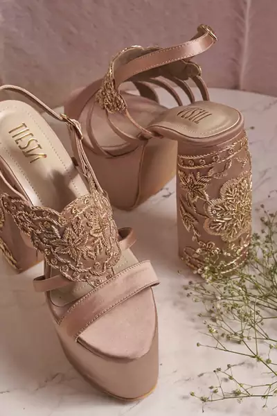 Nude woven leather heels