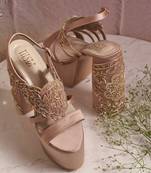Nude woven leather heels