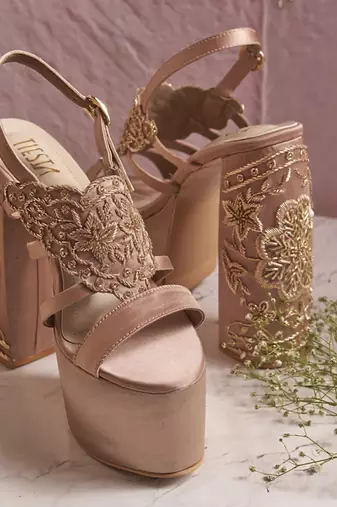 Nude woven leather heels