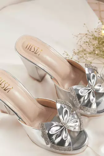 Silver woven leather heels
