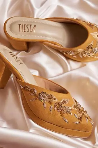 Yellow woven leather heels