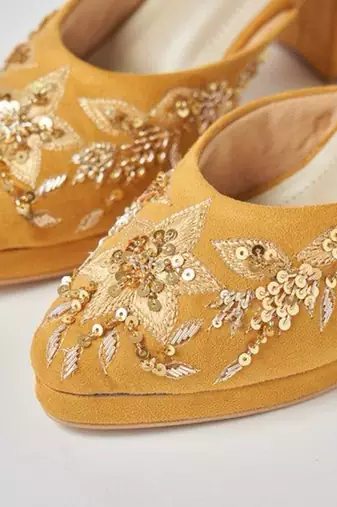 Yellow woven leather heels