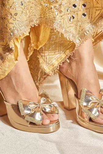 Gold woven leather heels
