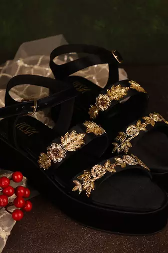 Black woven leather sandals