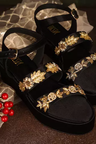 Black woven leather sandals