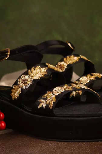 Black woven leather sandals