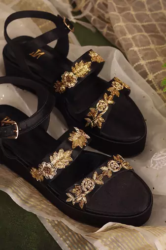 Black woven leather sandals