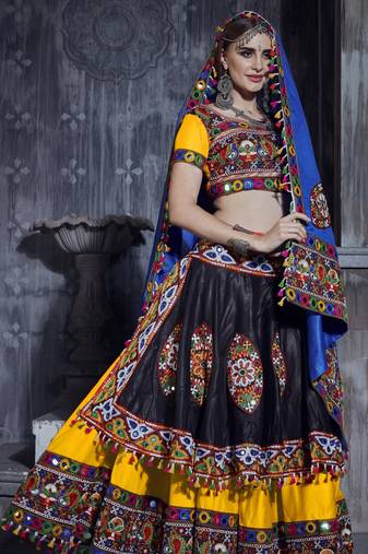 Yellow and Black Gamthi work Rajwadi dress with blue Traditional Dupatta for this Navratri garba