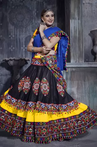 Yellow and Black Gamthi work Rajwadi dress with blue Traditional Dupatta for this Navratri garba