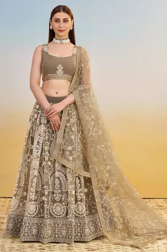 IVORY NET FABRIC LEHENGA WITH SEQUINS AND THREAD EMBROIDERY WORK