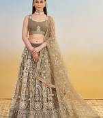 IVORY NET FABRIC LEHENGA WITH SEQUINS AND THREAD EMBROIDERY WORK