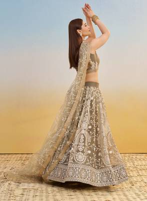 IVORY NET FABRIC LEHENGA WITH SEQUINS AND THREAD EMBROIDERY WORK 4