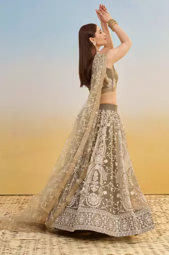 IVORY NET FABRIC LEHENGA WITH SEQUINS AND THREAD EMBROIDERY WORK