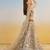 IVORY COLOR NET FABRIC LEHENGA WITH SEQUINS AND THREAD EMBROIDERY WORK