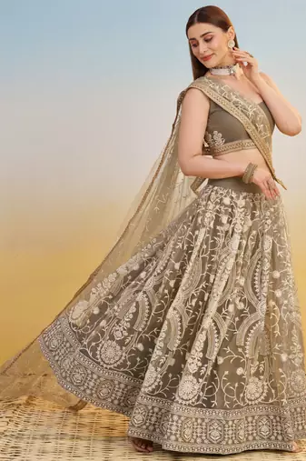 IVORY NET FABRIC LEHENGA WITH SEQUINS AND THREAD EMBROIDERY WORK