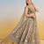 IVORY COLOR NET FABRIC LEHENGA WITH SEQUINS AND THREAD EMBROIDERY WORK