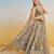 IVORY COLOR NET FABRIC LEHENGA WITH SEQUINS AND THREAD EMBROIDERY WORK