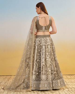 IVORY NET FABRIC LEHENGA WITH SEQUINS AND THREAD EMBROIDERY WORK 6