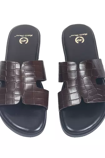 Brown solid leather flat