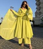 Elegant yellow colored party wear stitched cotton pant style kurti suit with duppatta