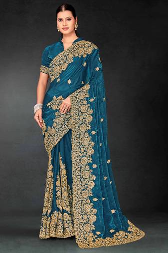 Teal blue sequin embroidered art silk saree with blouse piece