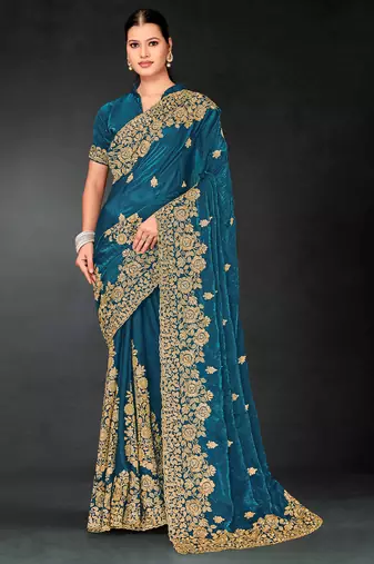 Teal blue sequin embroidered art silk saree with blouse piece