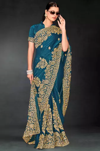 Teal blue sequin embroidered art silk saree with blouse piece