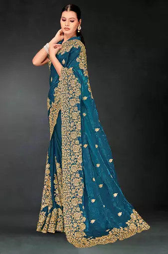 Teal blue sequin embroidered art silk saree with blouse piece