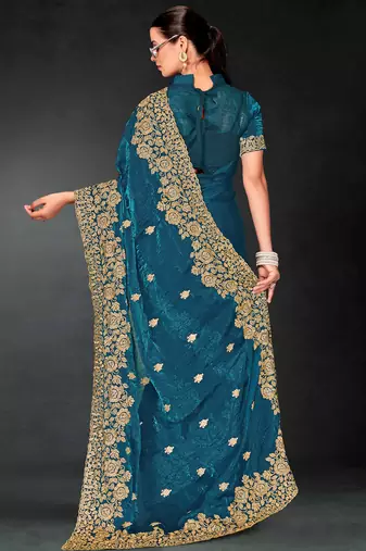 Teal blue sequin embroidered art silk saree with blouse piece
