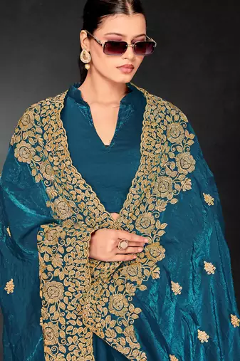 Teal blue sequin embroidered art silk saree with blouse piece