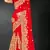 Red sequin embroidered art silk saree with blouse piece