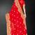 Red sequin embroidered art silk saree with blouse piece