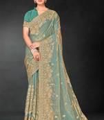 Sea green sequin embroidered art silk saree with blouse piece