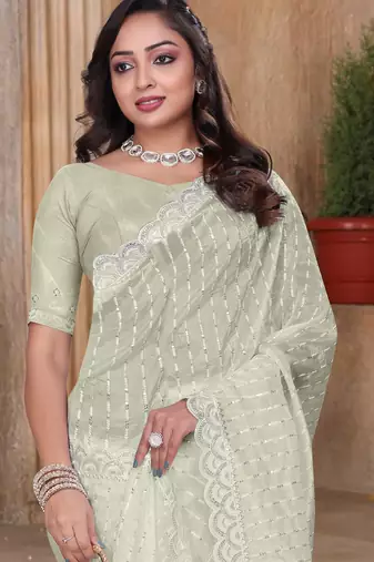 Cream sequin zari resham embroidered saree with matching blouse piece