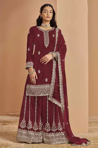 Rani pink dola silk jacquard with thread embroidery sequins work salwar kameez Full Stitched Free Size