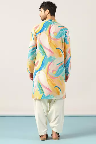 Yellow abstract printed kurta patiala set     traditional indian outfit for celebrations