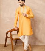 Yellow kurta pant set with bead embellishments     indian festive designer wear