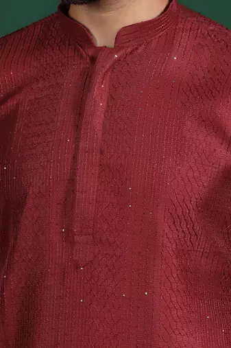 Red embroidered kurta pyjama set     elegant indian festive wear for men