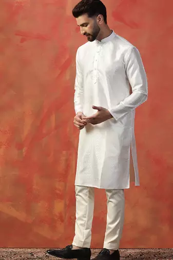 White embroidered kurta pant set     sophisticated indian traditional wear