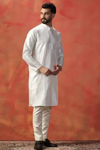 White embroidered kurta pant set     sophisticated indian traditional wear